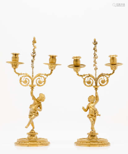 A pair of Napoleon III two branch candelabra