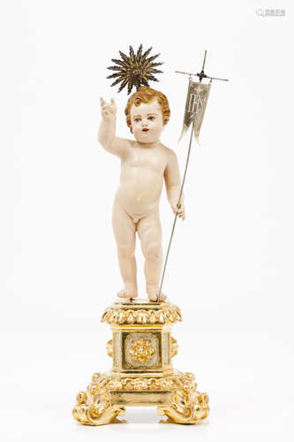 The Child Jesus on a gilt wooden stand