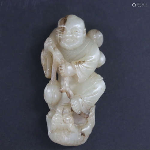 A White Jade Carved Figure Ornament