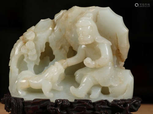 A HETIAN JADE CARVED FIGRUE STORY PATTERN PENDANT