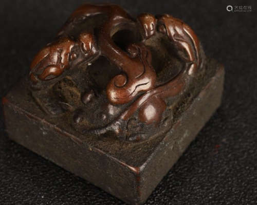 A COPPER CASTED DRAGON PATTERN SEAL