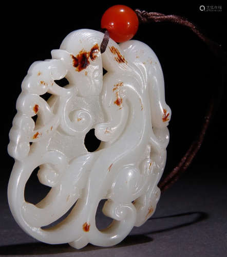 A HETIAN JADE PENDANT CARVED WITH DRAGON