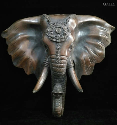 A COPPER CASTED ELEPHANT ORNAMENT
