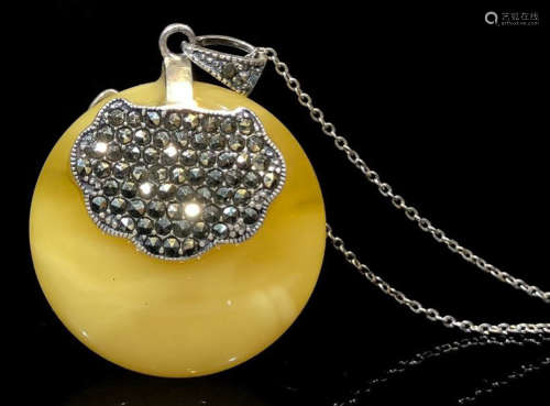 A SILVER WITH BEESWAX NECKLACE