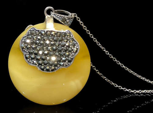 A SILVER WITH BEESWAX NECKLACE