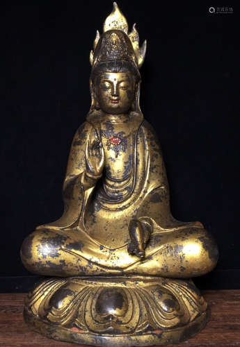 A COPPER CASTED BUDDHA STATUE