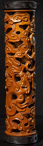 A HUANGYANG WOOD DRAGON PATTERN INCENSE HOLDER