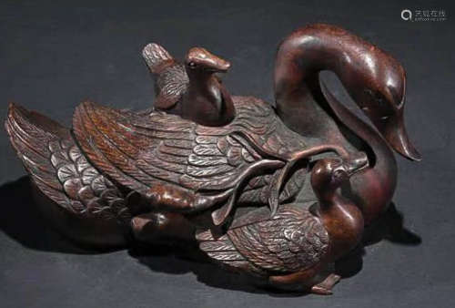 A CHENXIANG WOOD CARVED DUCK SHAPE PENDANT