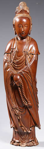 A HUANGYANG WOOD FIGURE STATUE