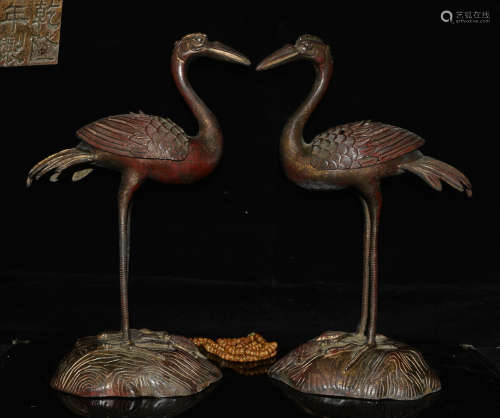PAIR OF COPPER CASTED CRANE SHAPED CANDLE HOLDER