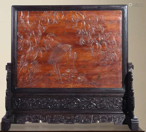 A HUANGYANG WOOD SCREEN CARVED WITH CRANE