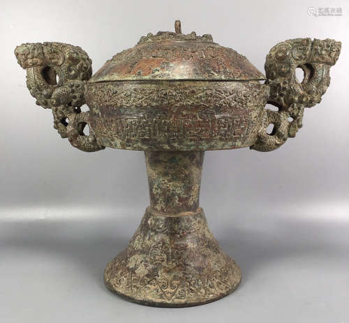 A BRONZE CASTED CONTAINER