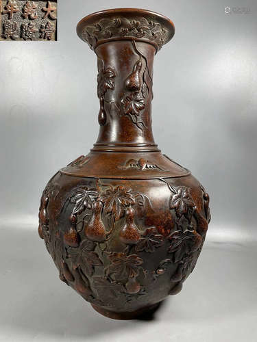 A COPPER VASE CARVED WITH BEAST&PEARS