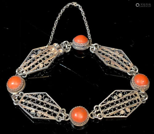 A SILVER CASTED BRACELET WITH CORAL