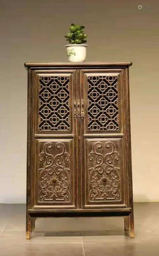 A HETAO WOOD CARVED CABINET