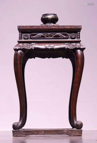 A HETAOMU WOOD CARVED TABLE