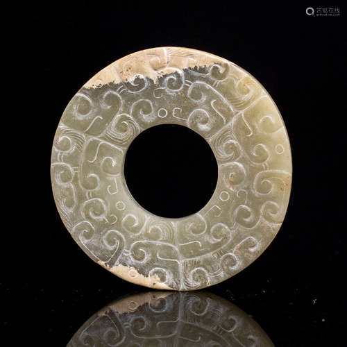 A CLOUD CARVED JADE BI