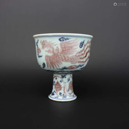 A BLUE AND WHITE UNDERGLAZED RED PHOENIX PORCELAIN STEM CUP