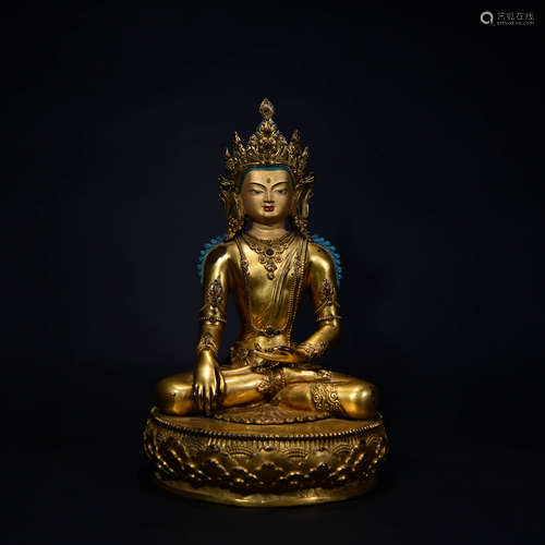 A GILD BRONZE LOTUS BUDDHA STATUE