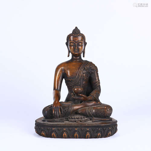 A BRONZE STATUE OF SAKYAMUNI