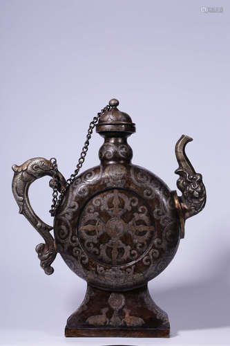 TIBETAN BRONZE CAST AND SILVER INLAID 'VAJRA' EWER WITH LID