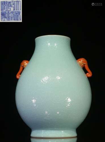 CELADON GLAZED AND IMPRESSED 'DRAGONS' VASE WITH ELEPHANT MASK HANDLES