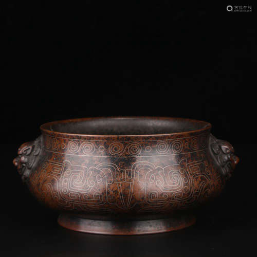 A FILIGREE BEATS EARS COPPER INCENSE BURNER