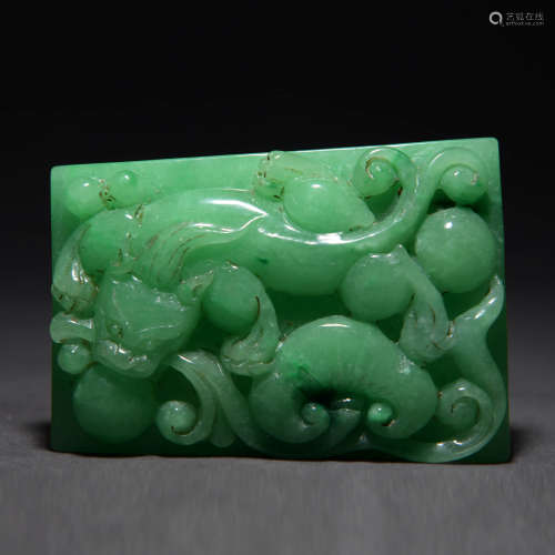 A Chi Dragon Carved Jadeite Pendant