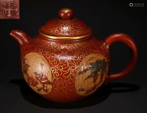 A ZISHA CARVED TEAPOT OUTLINE IN GOLD