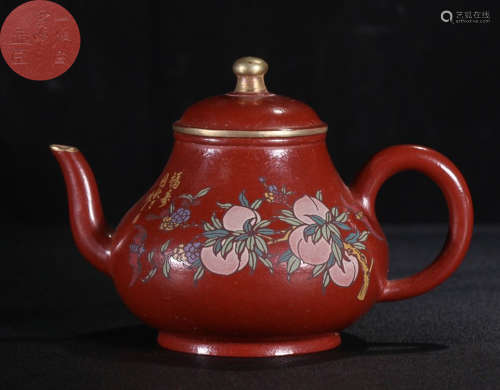 A DAHONGPAO CARVED TEAPOT OUTLINE IN GOLD