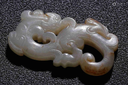 A HETIAN JADE CARVED DRAGON PATTERN PENDANT