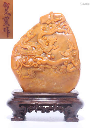 A TIANHUANG STONE CARVED PENDANT