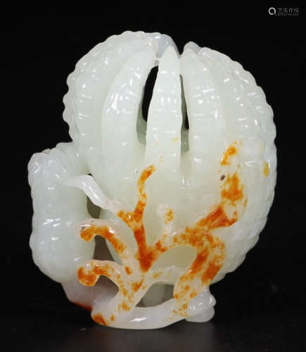 A HETIAN JADE CARVED CHAYOTE PENDANT