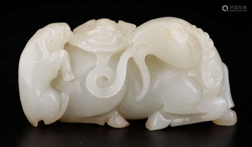 A HETIAN JADE CARVED GOAT SHAPED PENDANT