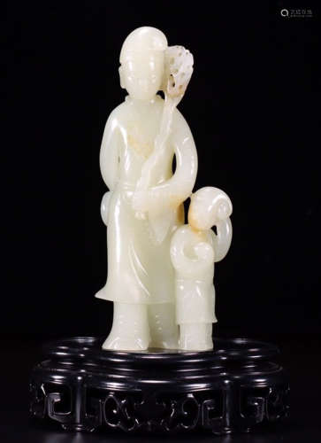 A HETIAN JADE CARVED FIGURE SHAPED PENDANT