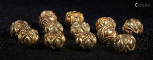 SET OF GOLD CASTED BEADS