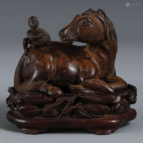 A CHENXIANG WOOD CARVED HORSE SHAPED PENDANT