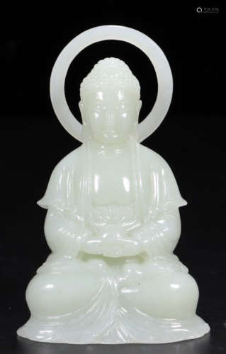 A HETIAN JADE CARVED BUDDHA STATUE