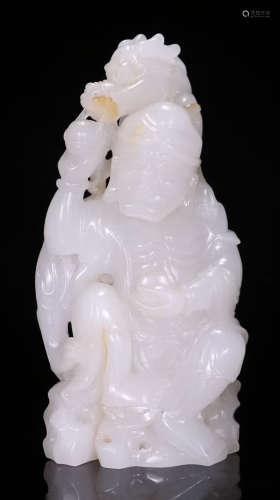 A HETIAN JADE CARVED ARHAT BUDDHA STATUE