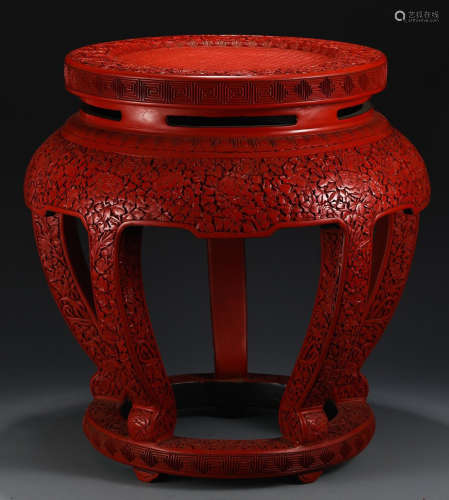 A LACQUER CARVED CHAIR