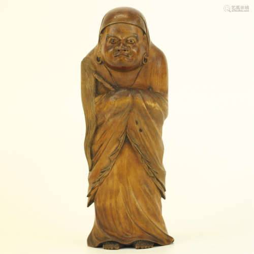 達磨木彫像