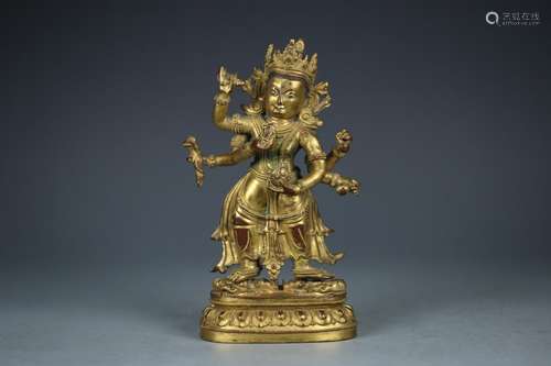 A Gilt Bronze Guanyin Statue