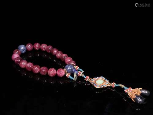 A Red Tourmaline 18-Bead Pendant