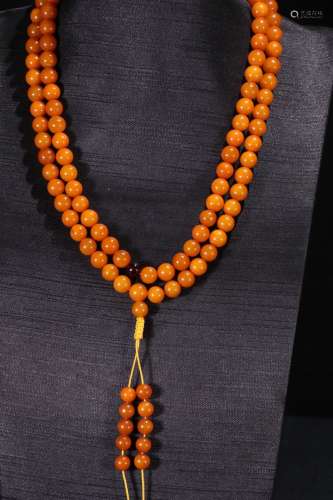 A Tibetan Amber 108-Bead Necklace
