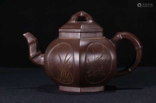 A Zisha Teapot With Plum Pattern