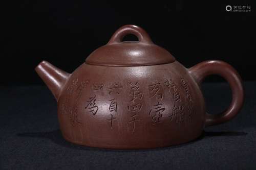 A Zisha Teapot With Potery Carving