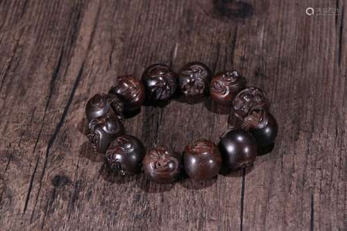 An Agarwood Buddha Pattern Braclet