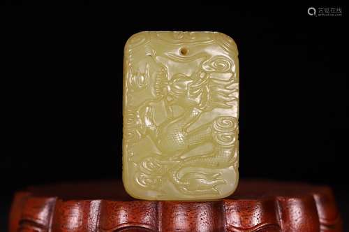 A Hetian Jade Dragon Carved Pendant