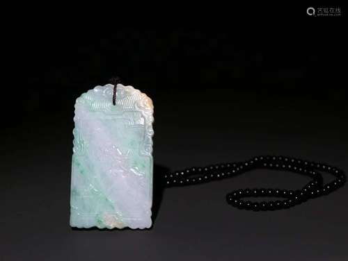 A Jadeite Story Carved Pendant