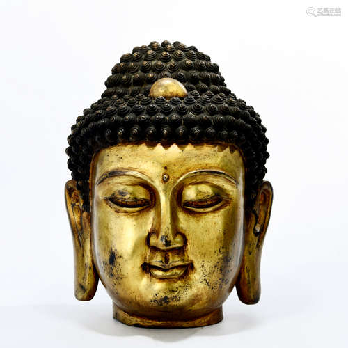 A Gild Bronze Buddha s Head Ornament